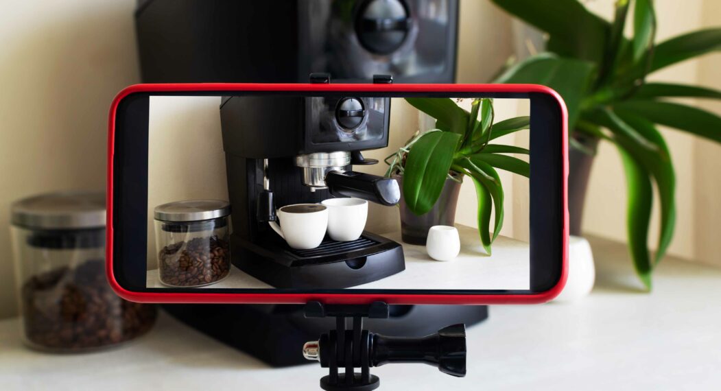 photography header image phone on tripod filming coffee machine 